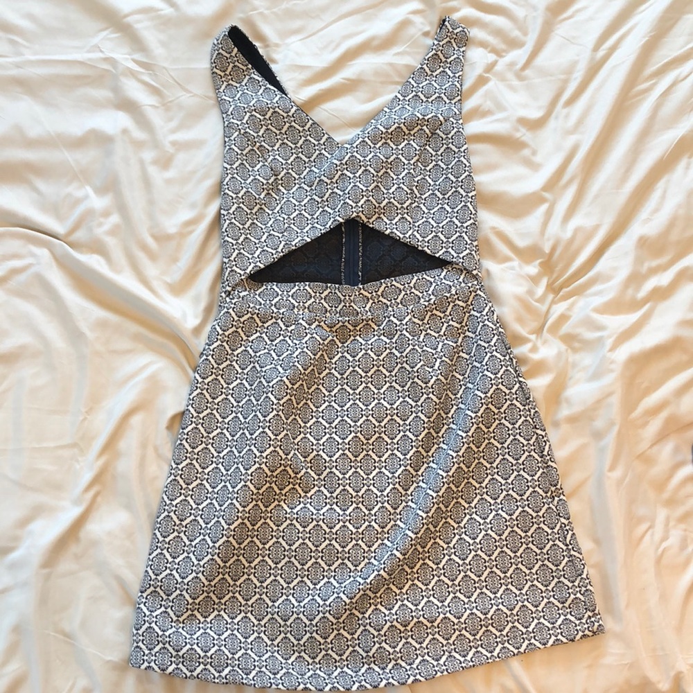 Patterned and embroidered cocktail dress